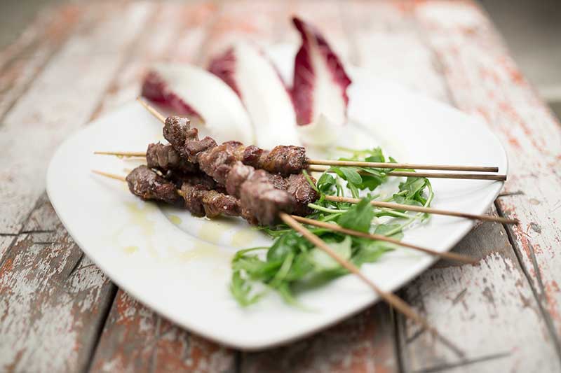 Savory marinated seasoned arrosticini from Abruzzo