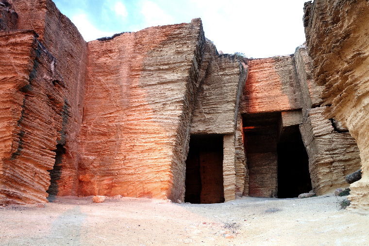  sunrise light over a giant tuff cave — Photo by spumador