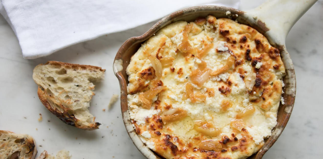 Baked ricotta dip with oil infused garlic