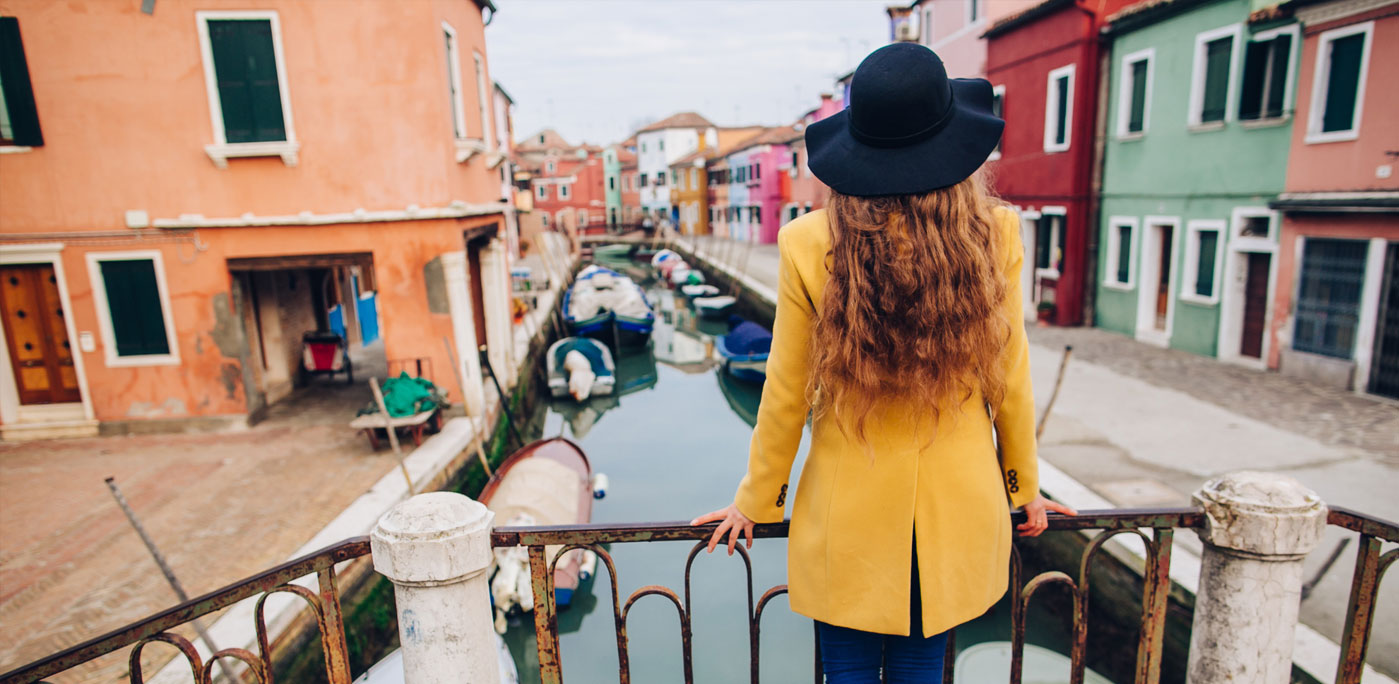 Even a brief stroll in Venice can take you under buildings and over water. Photo by anatoliycherkas