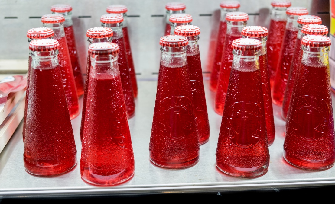 Who invented the iconic Campari Soda bottle?